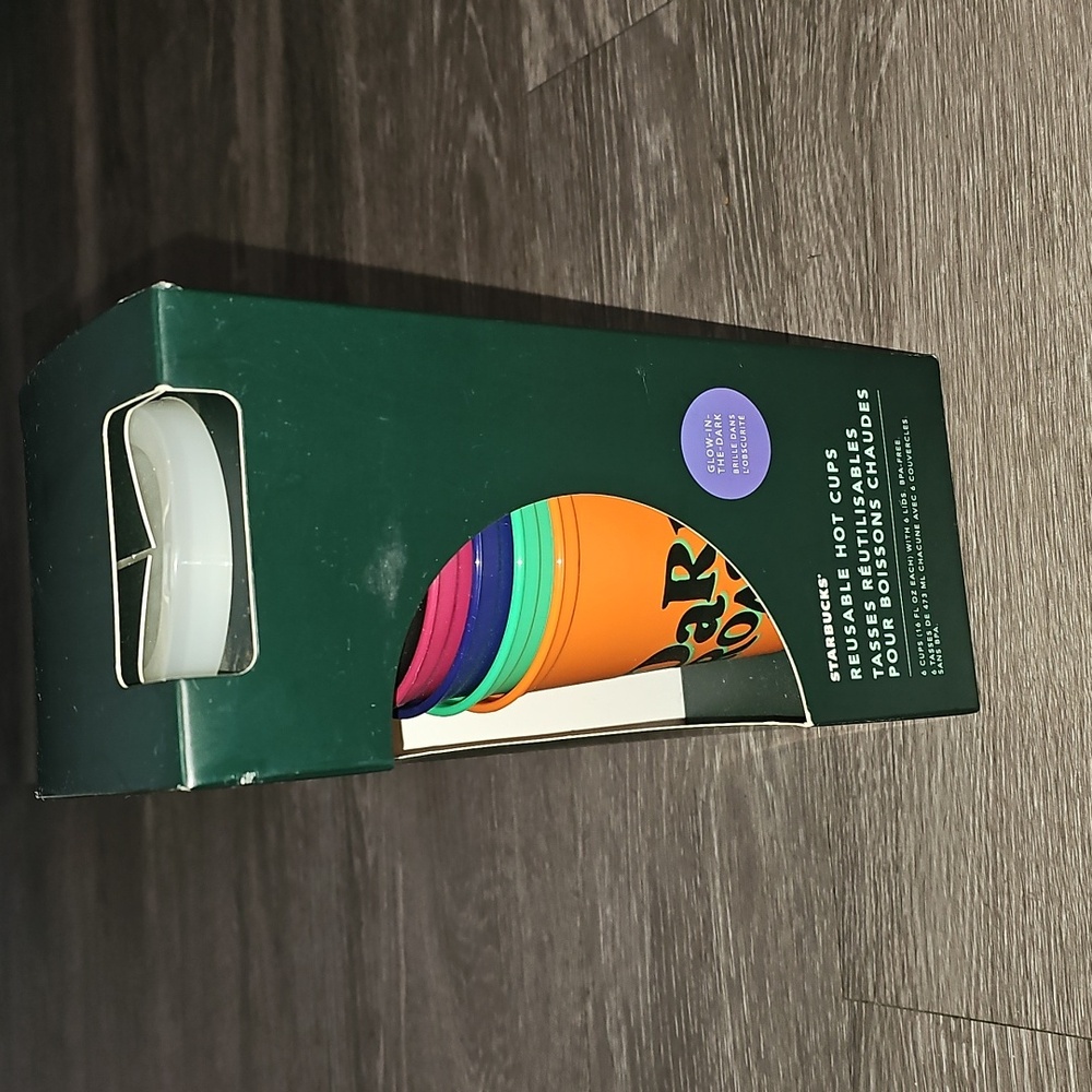 New in box Glow in the Dark Starbucks hot cups. Reusable. Has lids